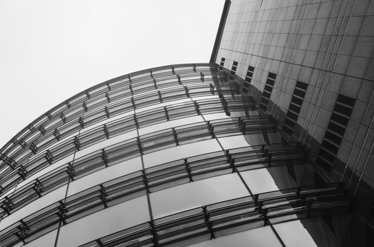 Business centre abstract architecture glass perspective view. Sky background. Black and white.