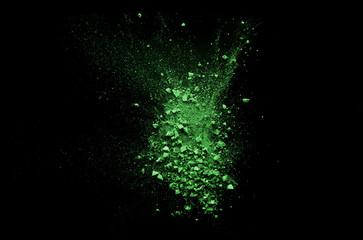 pink broken and spilled eye shadow on a black isolated background