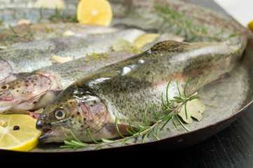 trout on a frying pan