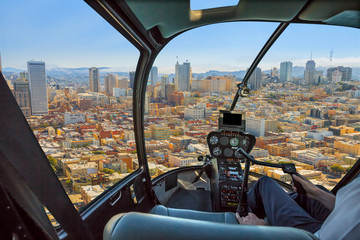Helicopter cockpit flies in San Francisco Financial District Downtown, California, United States,...