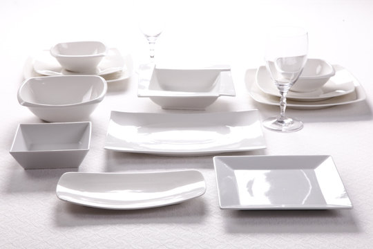 plate set on a white tablecloth, tableware 