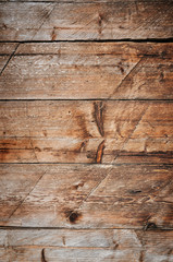 Barn wall abstract naturaly weathered wooden shabby rustic dirty planks closeup vertical background texture