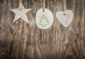 Christmas decorations over rustic wooden background