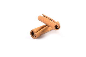 Cinnamon sticks on white