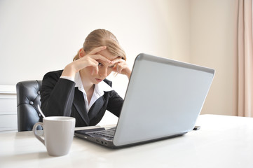 Woman in stress at work