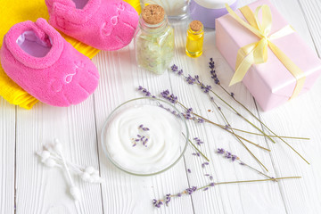 baby organic cream with lavender on shelf in bathroom