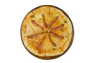 pizza with ham and olives on a wooden board