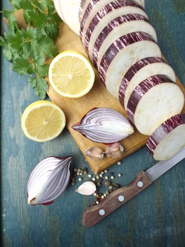 Italian Cuisine. Sliced eggplant, onions and lemon