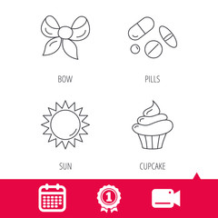 Achievement and video cam signs. Medical pills, sun and bow-knot icons. Cupcake linear sign. Calendar icon. Vector