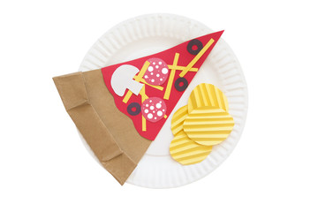 potato chips and pizza from a paper. slice of pizza and potato crisps made of colored paper on a disposable plate. the concept of junk food. isolated on white background, top view
