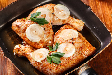 Raw chicken legs marinated