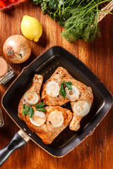 Raw chicken legs marinated