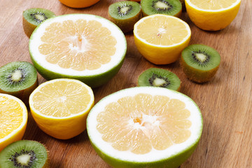 Fototapeta na wymiar Citrus fruit food, orange, lemon grapefruit and kiwi