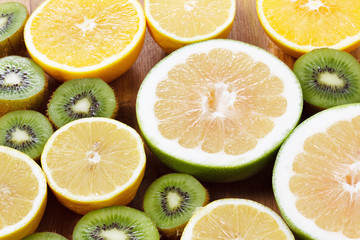 Orange, lemon citrus fruit healthy food and kiwi