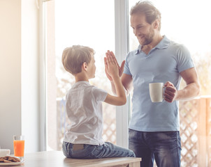 Father and son in kitchen