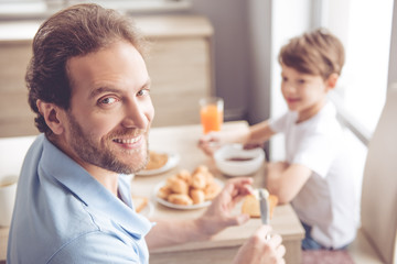 Father and son in kitchen