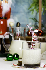 Glass of Eggnog with A Candy Cane Stir Stick