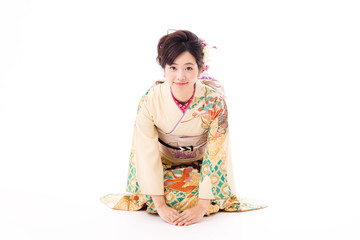 attractive asian woman wearing kimono isolated on white background