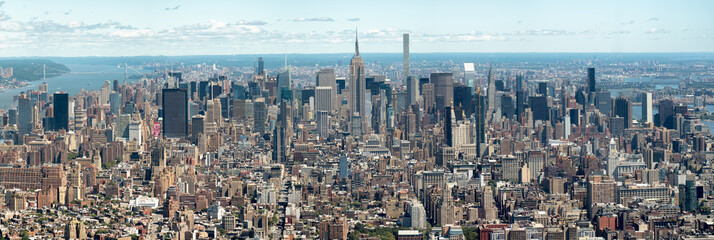 High resolution panoramic aerial view of New York City including several landmarks and the midtown skyline 