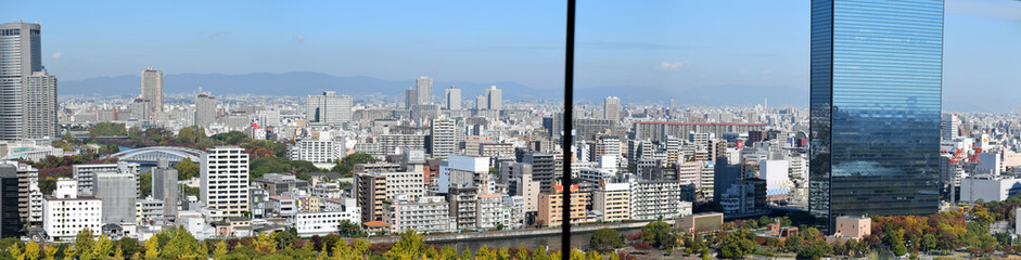 Fototapeta na wymiar Cityscape of Osaka city viewed from Osaka Castle, Osaka, Japan - Photo taken on November 6th, 2015