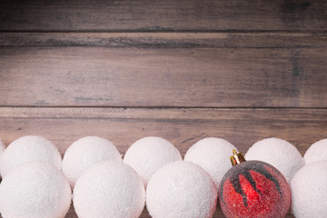 Christmas still life with balls on the wooden background