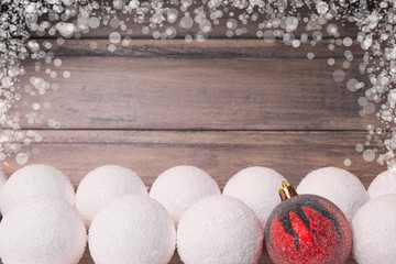 Christmas still life with balls on the wooden background