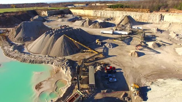 Industrial Gravel Pit Mining, Machines, Trucks, Aerial View
