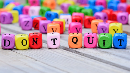 Don't quit words on table