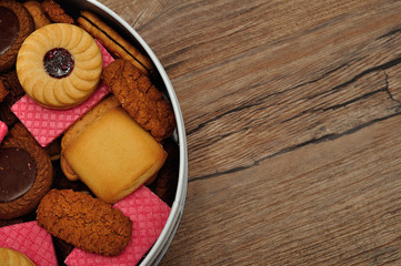 A tin filled with a variety of biscuits