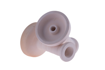 hookah bowl for tobacco shisha two ceramic products, beige ceramic bowls, two clay vessels, clay vessels lie crosswise, pottery, two beige clay products