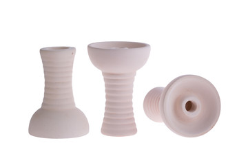 hookah bowl for tobacco shisha three figured ceramic products, pottery with long curly legs, three clay bowls arranged in a row, three beige clay vessels with curly legs