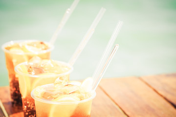 Concept of luxury tropical vacation. Three Cuba Libre cocktails