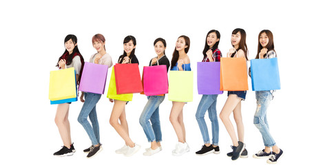 Obraz premium Happy young woman group enjoy shopping