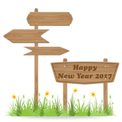 Happy New Year 2017 text on Wooden signpost