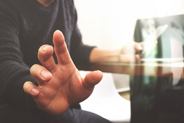 Businessman hand using mobile payments online shopping,pencil,om
