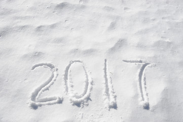 2017 New Year text on now background