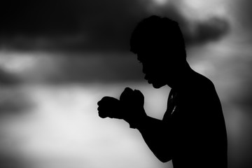 Silhouette of a man Show of strength  Muay Thai