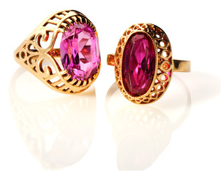 Fototapeta premium Two golden rings over white