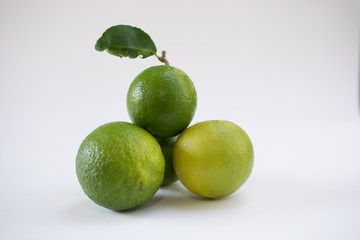 .Keep fresh lemon sour vitamin C from fresh green on a white bac