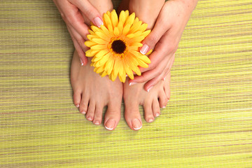 Closeup photo of a beautiful female feet with pedicure
