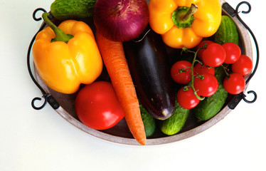 Composition with assorted raw organic vegetables wooden table