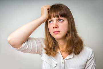 Fototapeta premium Young disappointed woman in depression
