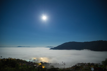 super full moon and fog in the morning with mountain at Khao Kho