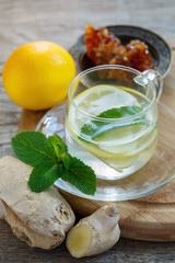 Hot drink with ginger, lemon, mint and honey.