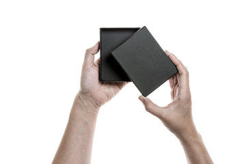 Two hands hold a empty(blank) gift box isolated white.