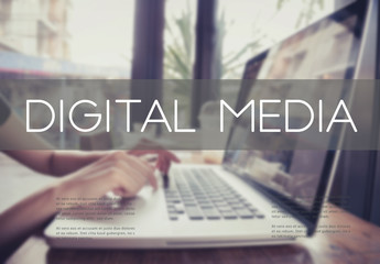 Naklejka premium business hand typing on a laptop keyboard with digital media homepage on the computer screen social network concept.