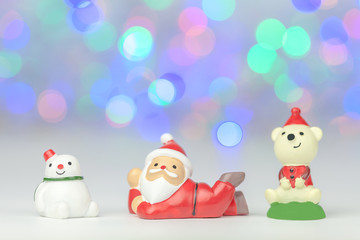 Santa claus and snowman with  bokeh background