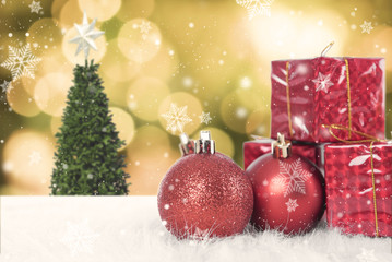 Christmas balls with gift box and snowflake on christmas tree background.