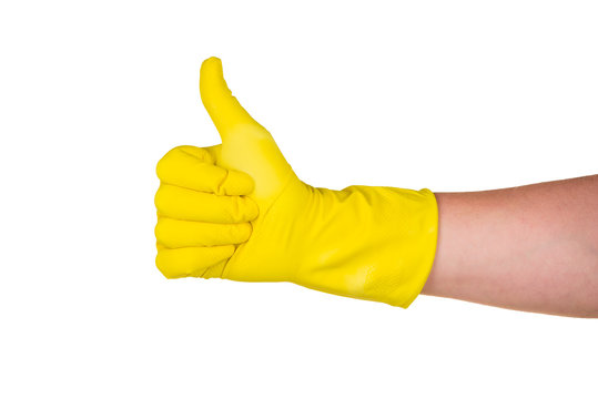 the man's hand in a rubber glove shows gesture ok isolated