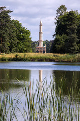 minaret with pond in the park, castle Lednice, Czech Republic